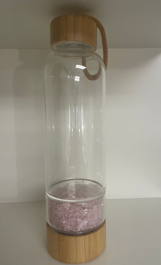 Crystal bottle with pink quartz